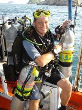In Full tech rig.Another day in the office. 4 tanks of Trimix and a wreck to dive on. Things could be worse.
